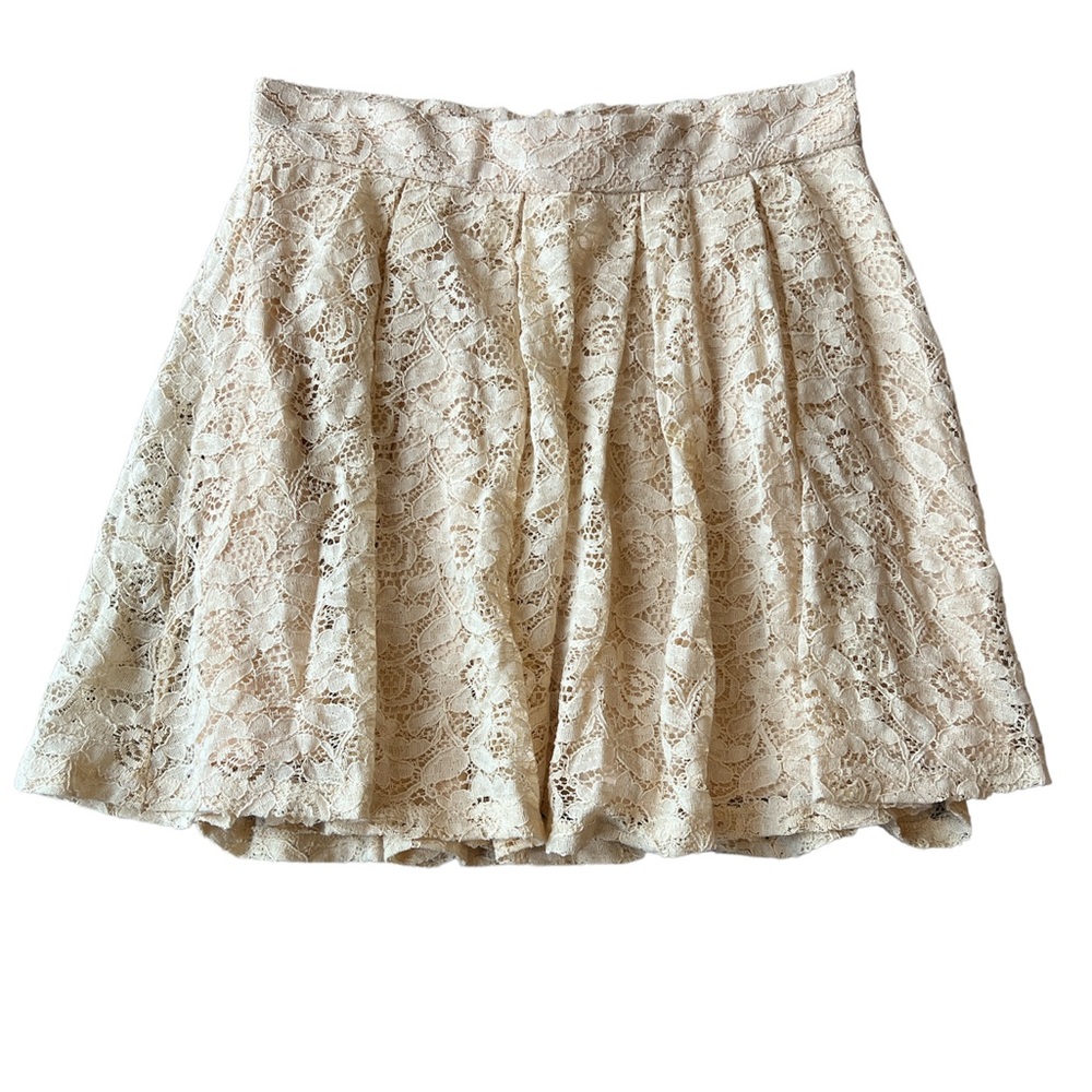 Forever 21 skirt size small.  Lined on the inside and lacy on the outside.